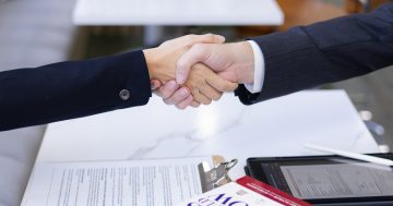 lawyer and client shaking hands