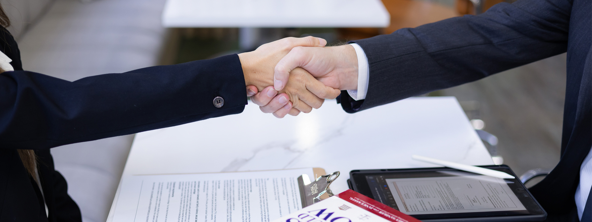 lawyer and client shaking hands